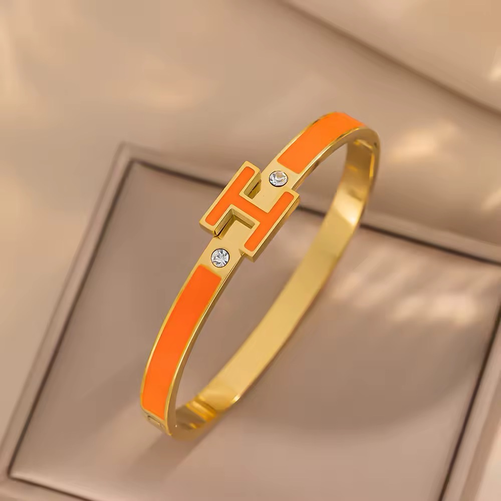 Elegant Gold and Orange Bracelet
